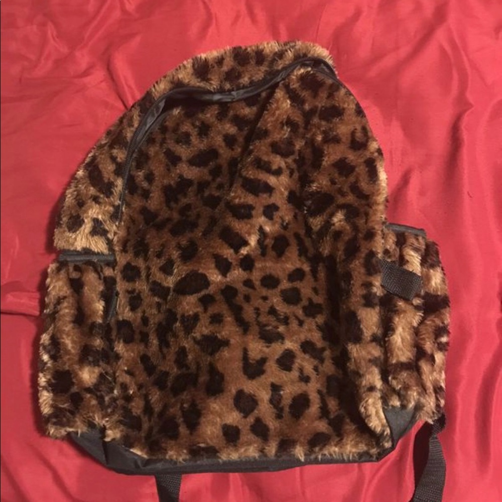 A leopard print book bag